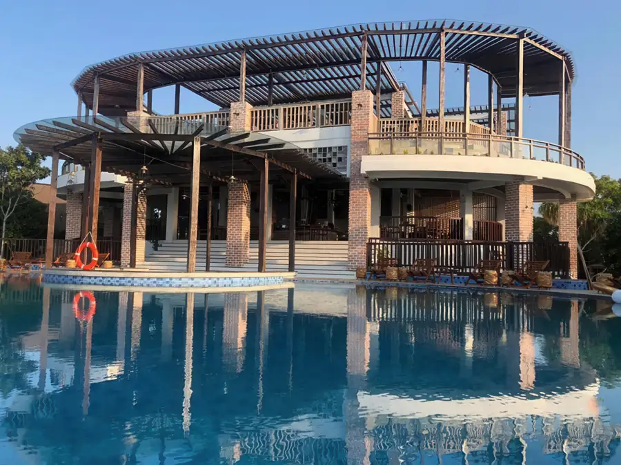 Scenic view of the wooden overwater chalets at the resort Mussah Poteh Resort