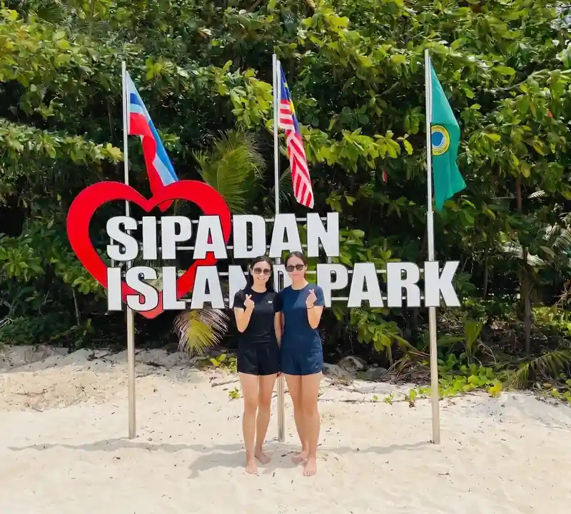 Scuba diving Sipadan to see huge schools of fish with Mussah Poteh Resort