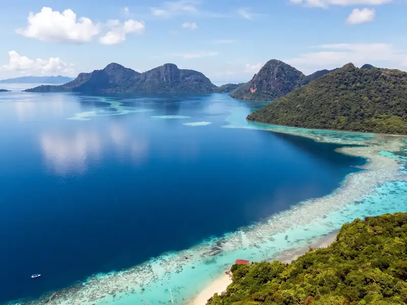 Island hopping around the Tun Sakaran Marine Park with Mussah Poteh Resort